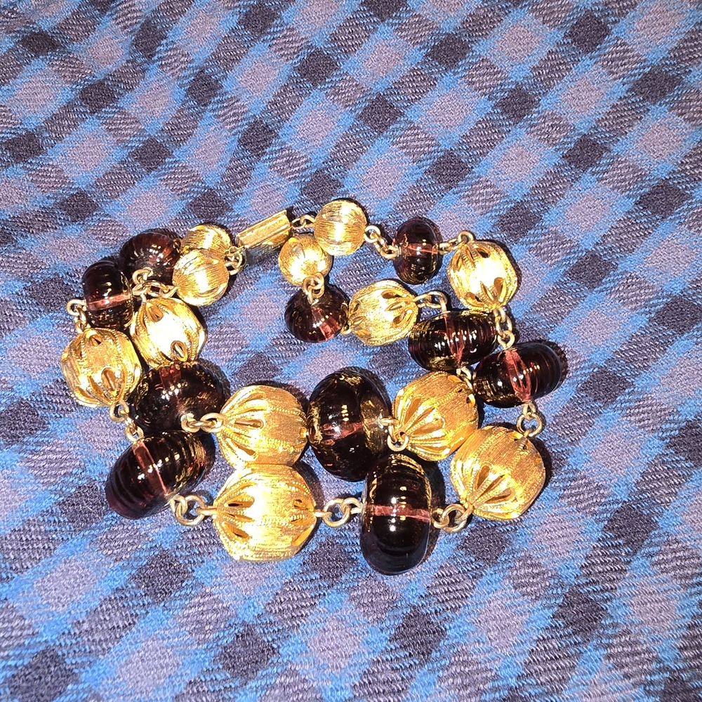 Elegant Gold and Purple Bracelet